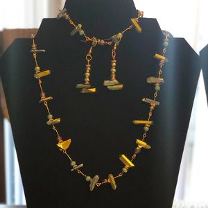 Jewelry Set: earrings, neckless & bracelet.